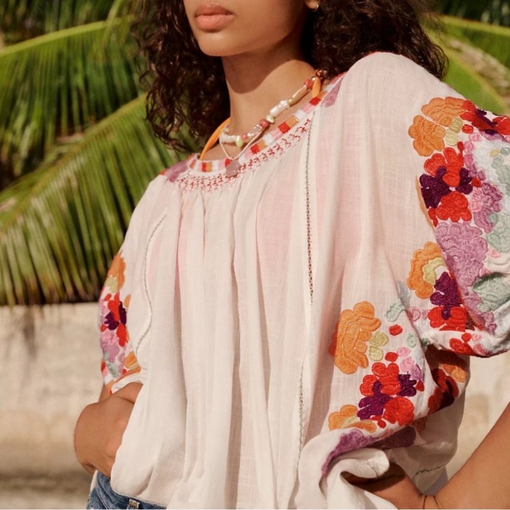Anthropologie Short Sleeve Embroidered Tunic Top in pink pattern